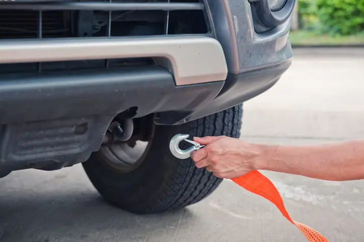 Carolina Collision and Frame Service | Close up of a truck being hitched for towing